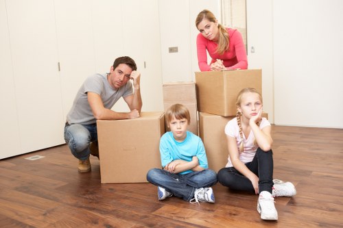 Trained removal staff carrying items carefully during a move